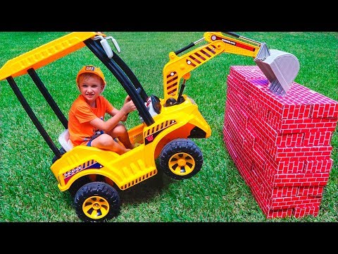 Tractor breaks down the walls - Vlad ride on power wheel to help kid