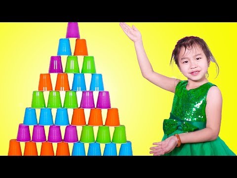 Jannie Stacking A HUGE Cup Pyramid