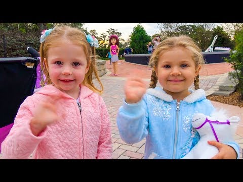 Nastya, Roma and Diana play in the park