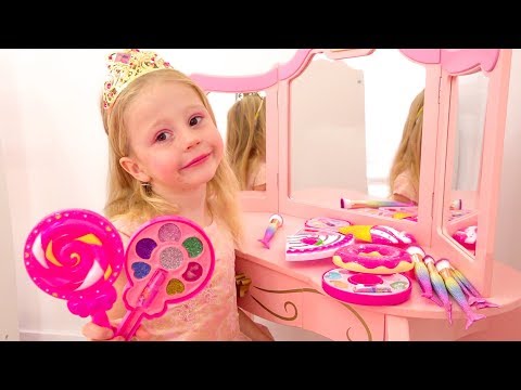 Nastya playing with make up toys and dress up