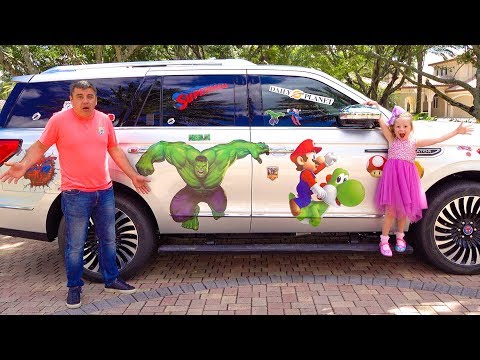 Nastya decorated papa's car with superheroes