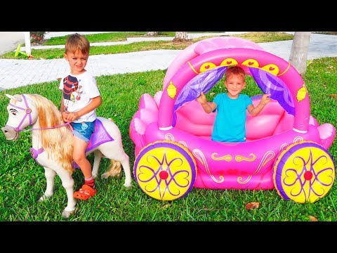 Vlad and Nikita play with Princess Carriage