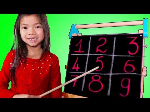 Emma Pretend Play as a Math Teacher