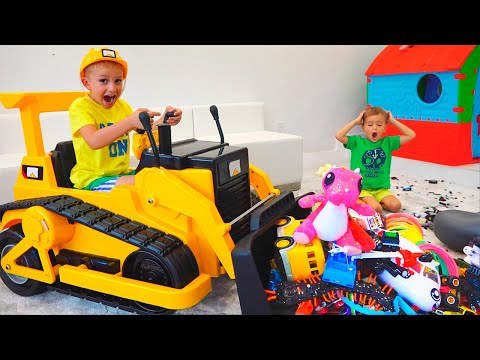 Vlad and Nikita play with toys ride on excavator