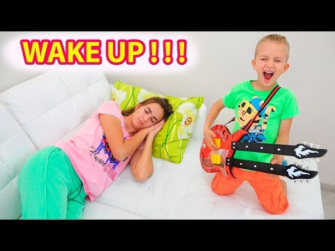 Vlad and Nikita pretend play music and wake up Mom