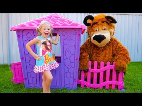 Nastya and papa are building playhouse for toys